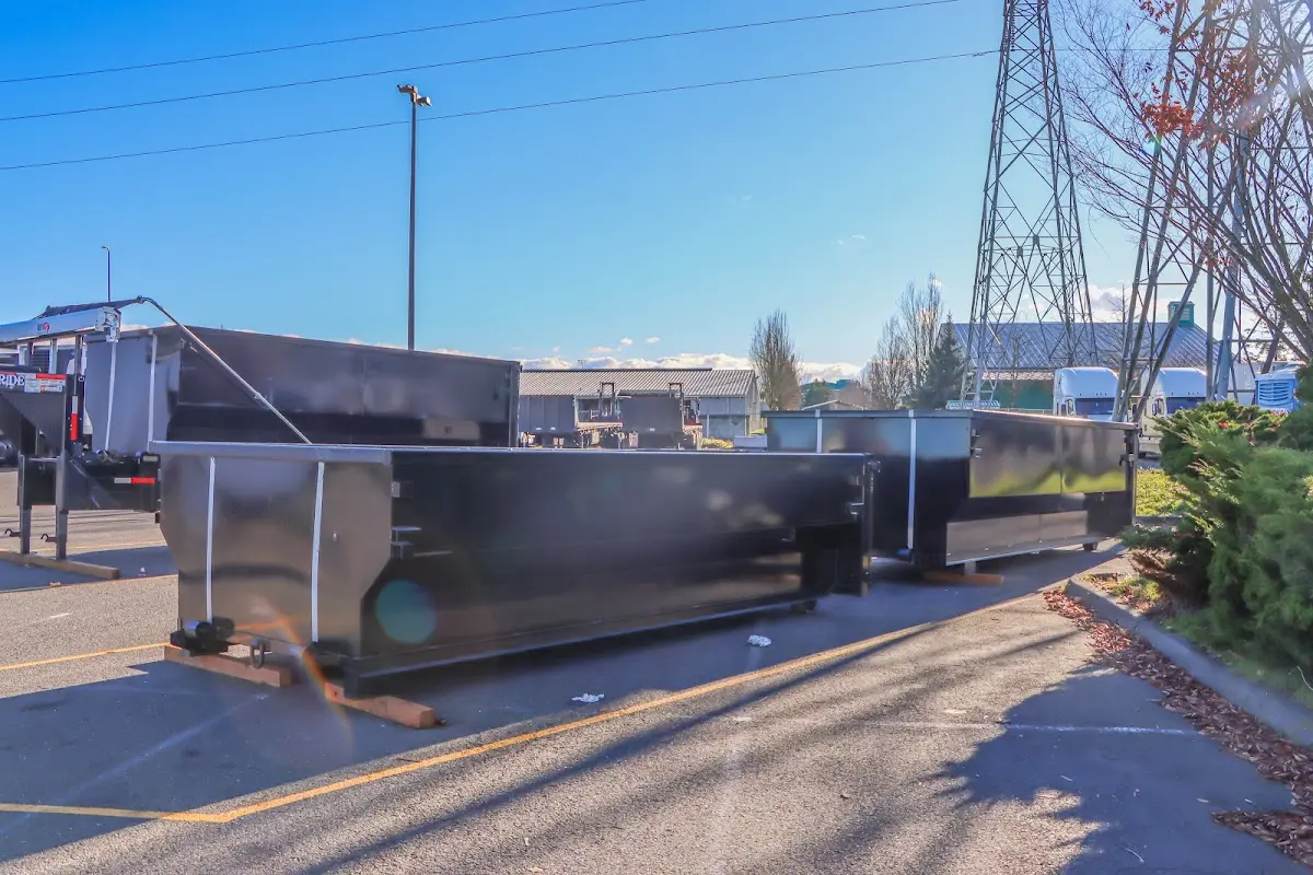 Roll-off dumpster ready for waste disposal at job site for 12 Yard Dumpster Rental in Hurley